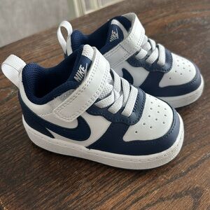 Toddler size 4 Nikes. Never worn.
